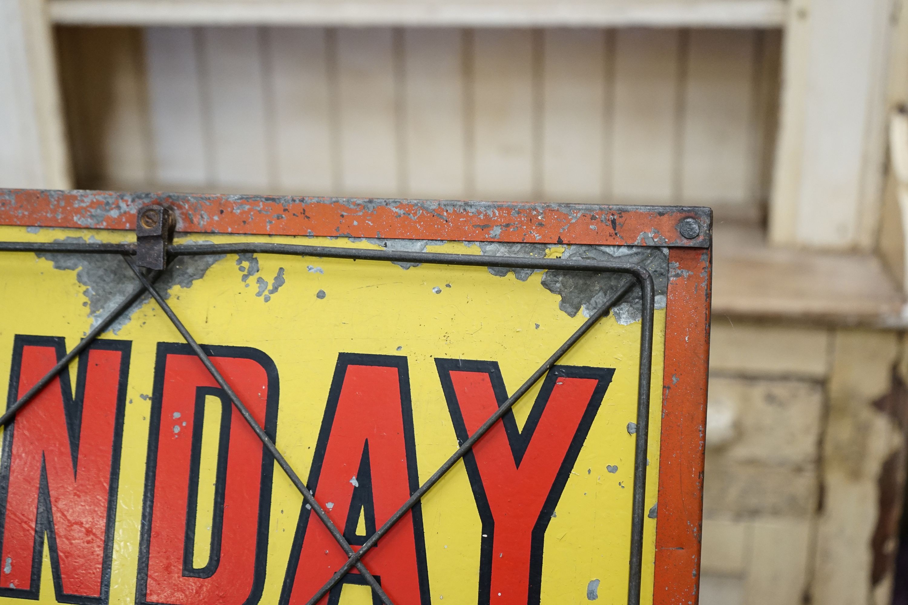 A mid century rectangular tin newspaper advertising sign, width 50cm, height 80cm